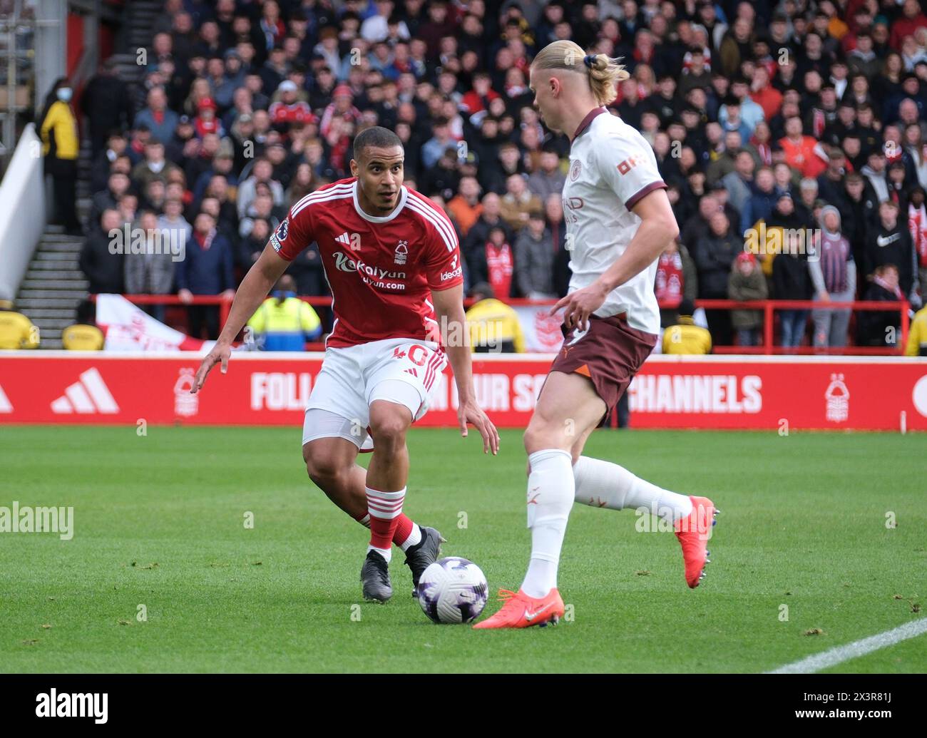 The City Ground, Nottingham, UK. 28th Apr, 2024. Premier League Football, Nottingham Forest versus Manchester City; Erling Haaland of Manchester City looks to beat Murillo of Nottingham Forest Credit: Action Plus Sports/Alamy Live News Stock Photo