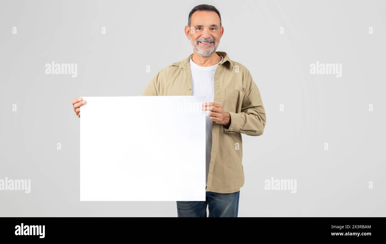 Man Holding White Board, Mockup, Copy Space Stock Photo