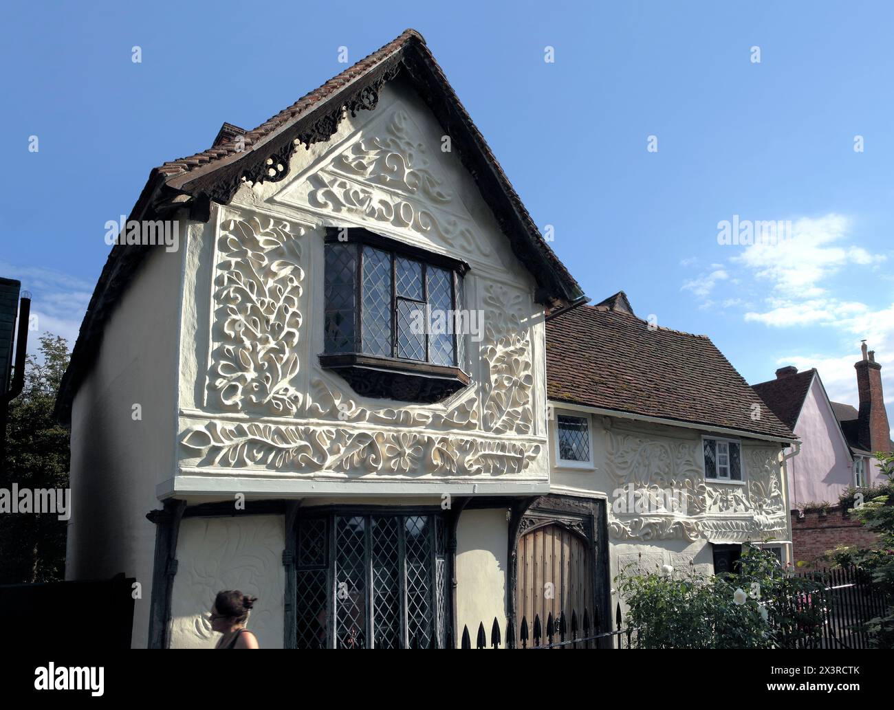 Midsummer late evening sunlight highlights pargeting on the restored Ancient House, Clare, Suffolk. Stock Photo