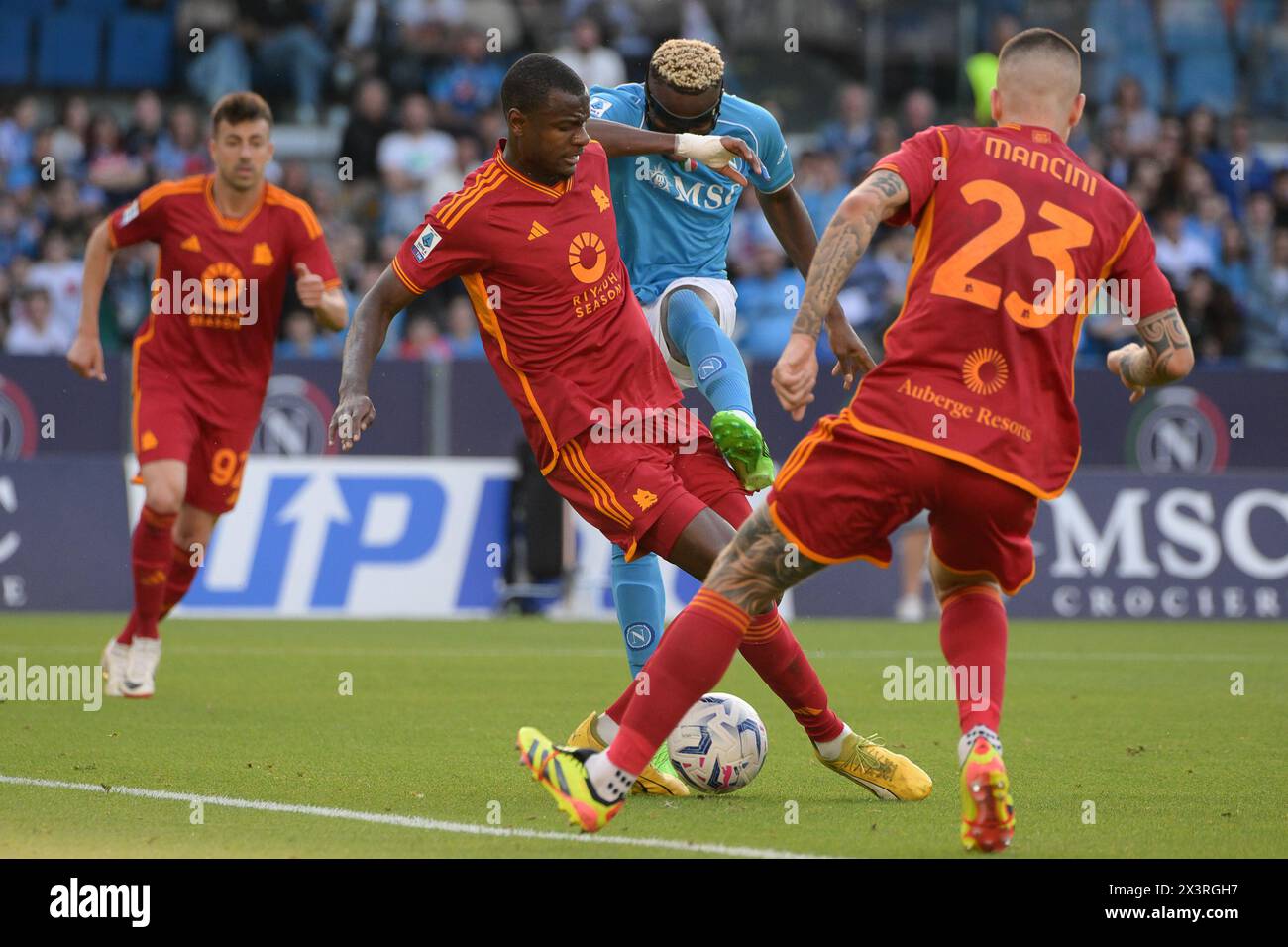 Naples, Italy. 28th April 2024, Stadio Diego Armando Maradona, Naples, Italy; Serie A Football; Napoli versus Roma;  Evan Ndicka of AS Roma blocks the shot from Victor Osimhen of SSC Napoli Credit: Action Plus Sports Images/Alamy Live News Stock Photo