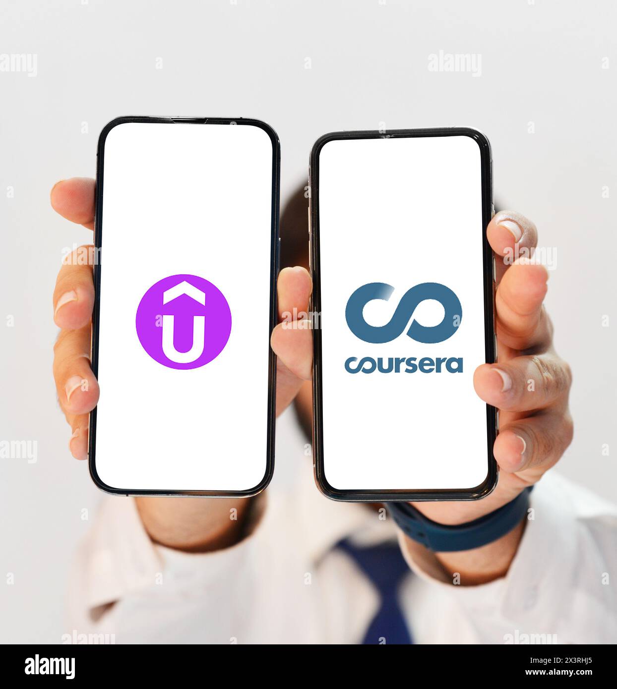 Udemy vs Coursea comparison for better learning opportunities, editorial educaton concept background Stock Photo