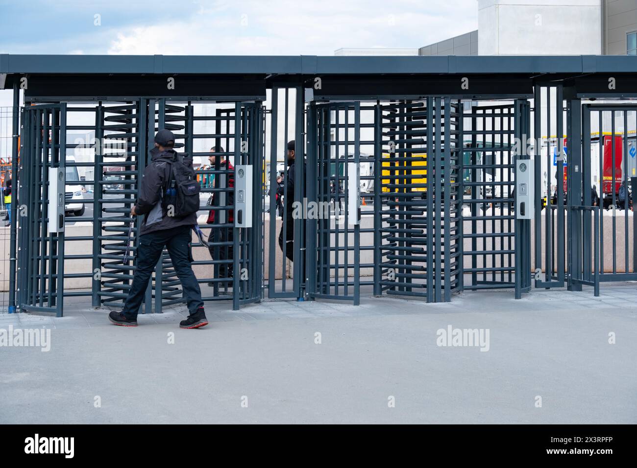 man passes through checkpoint Tesla Gigafactory Berlin-Brandenburg ...