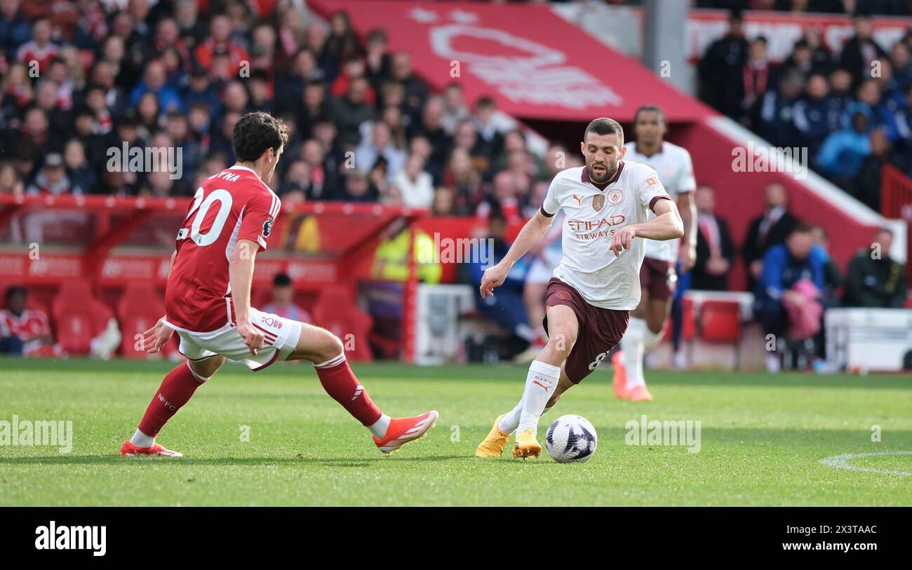 The City Ground, Nottingham, UK. 28th Apr, 2024. Premier League Football, Nottingham Forest versus Manchester City; Mateo Kovacic of Manchester City looks to beat Giovanni Reyna of Nottingham Forest Credit: Action Plus Sports/Alamy Live News Stock Photo