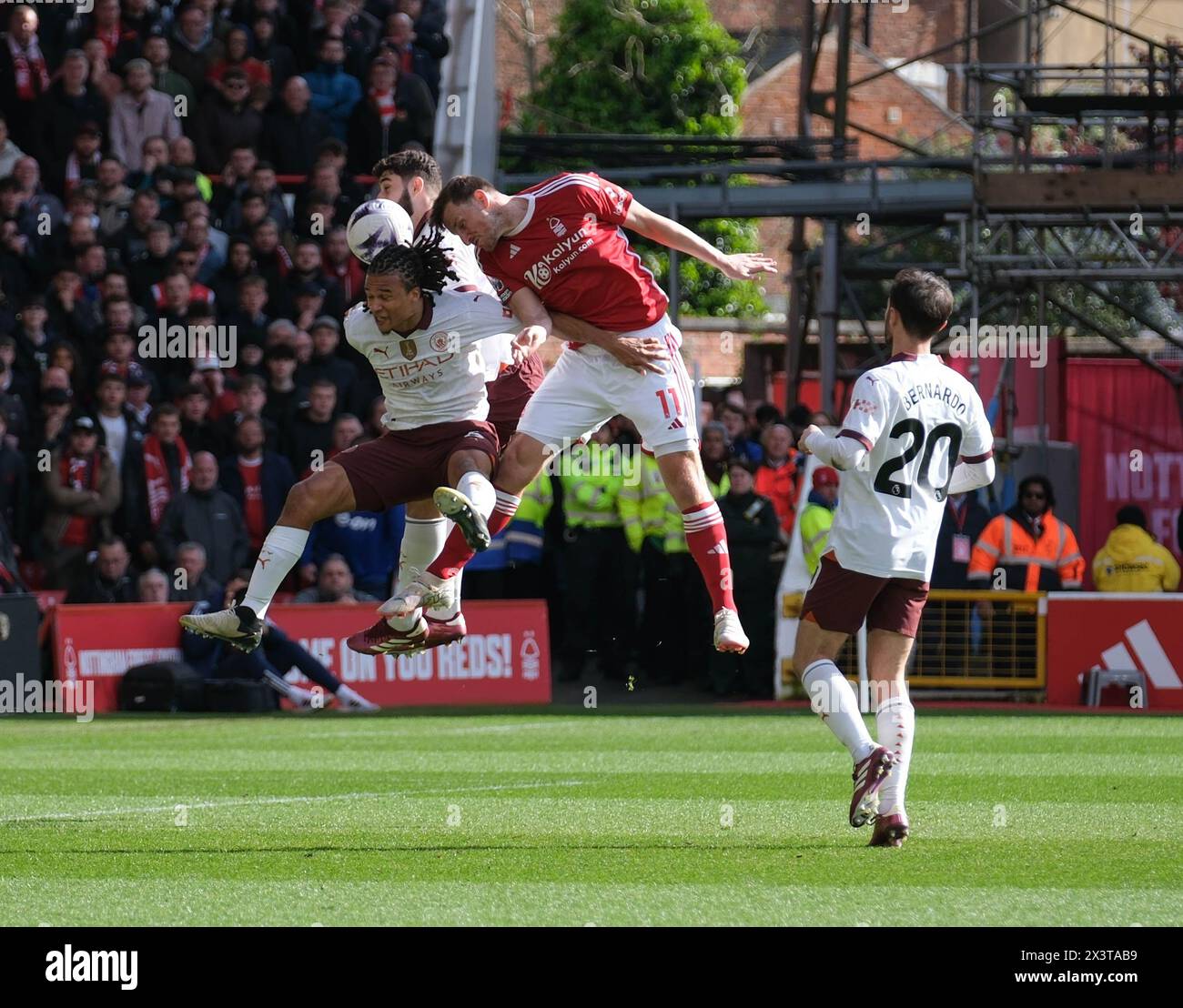 The City Ground, Nottingham, UK. 28th Apr, 2024. Premier League Football, Nottingham Forest versus Manchester City; Chris Wood of Nottingham Forest competes for the ball with Nathan Ake of Manchester City Credit: Action Plus Sports/Alamy Live News Stock Photo