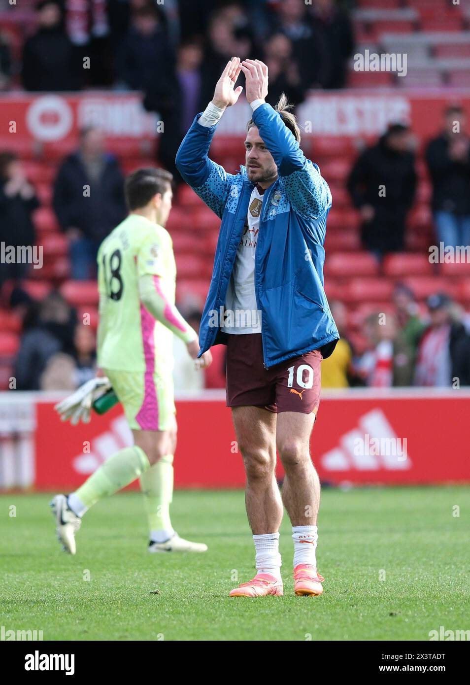 The City Ground, Nottingham, UK. 28th Apr, 2024. Premier League Football, Nottingham Forest versus Manchester City; Jack Grealish of Manchester City applauds the travelling away fans after the final whistle Credit: Action Plus Sports/Alamy Live News Stock Photo
