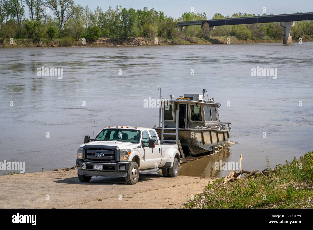 Waverly, MO, USA April 22, 2024 Launching a working boat by Munson