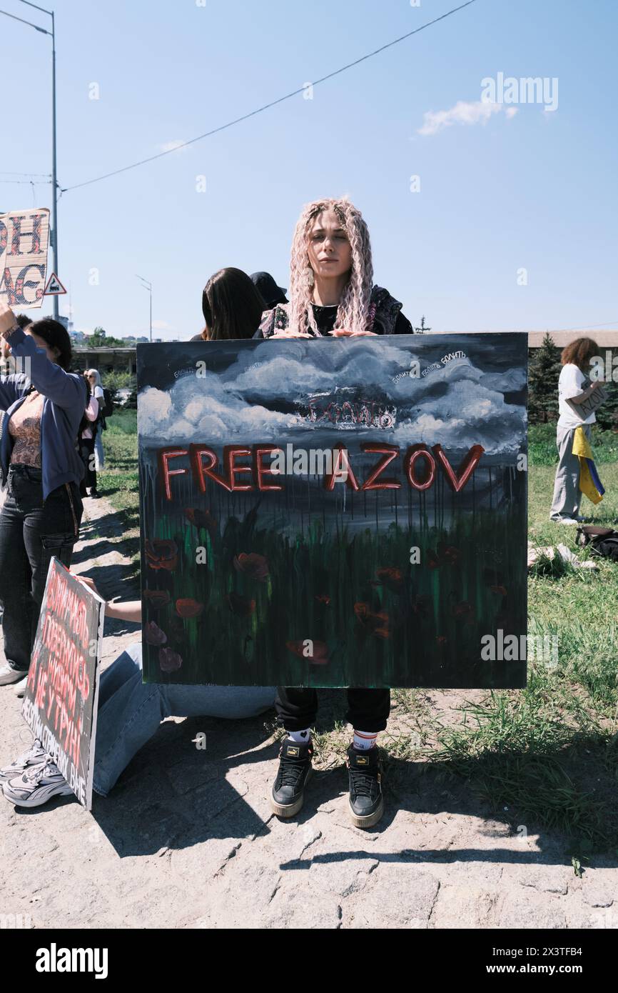 Kyiv, Ukraine - 28 April, 2024. Ukrainian protestors proudly wave Azov ...
