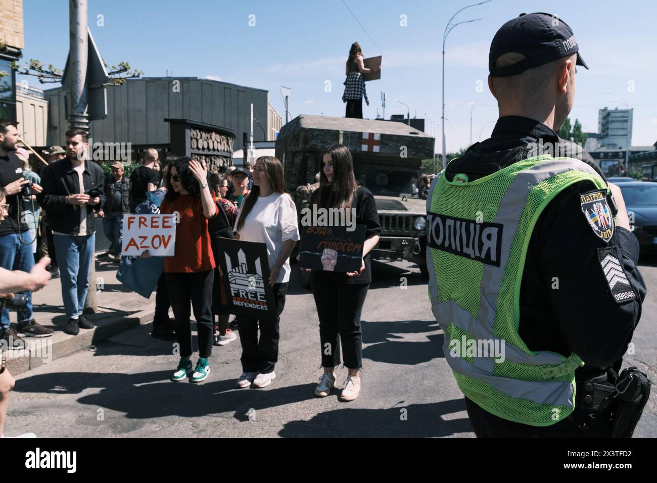 Kyiv, Ukraine - 28 April, 2024. Ukrainian protestors proudly wave Azov ...