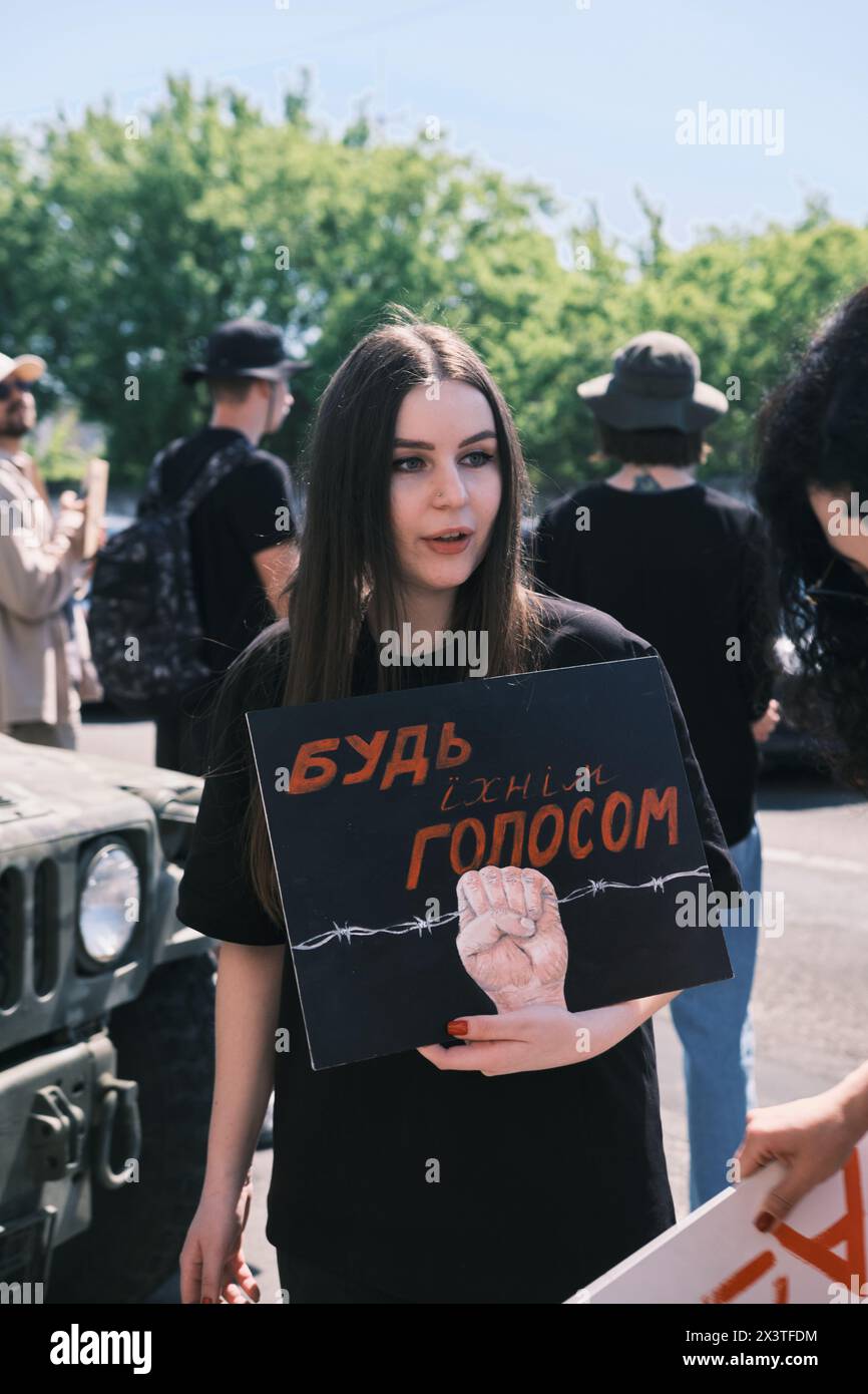 Kyiv, Ukraine - 28 April, 2024. Ukrainian protestors proudly wave Azov ...
