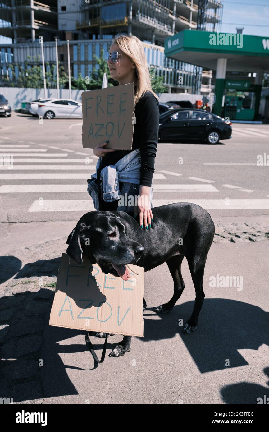 Kyiv, Ukraine - 28 April, 2024. Ukrainian protestors proudly wave Azov ...