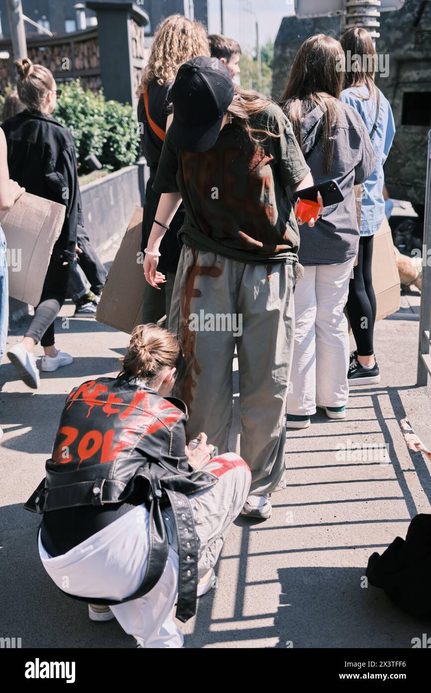 Kyiv, Ukraine - 28 April, 2024. Ukrainian protestors proudly wave Azov ...