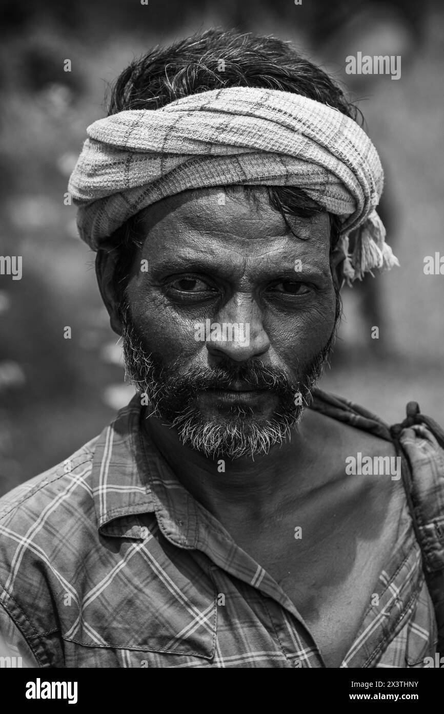 Portrait of a Indian Shepherd man in white turban in India. Indian Shepherd with traditional costume. Goa, India. January 19,2024 Stock Photo