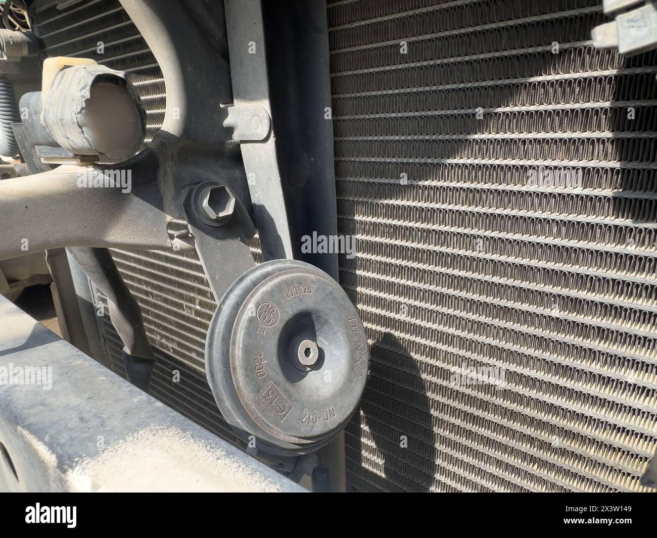 Front airbag impact sensor and horn in car front bumper closeup 05 March 2024 Pakistan Stock