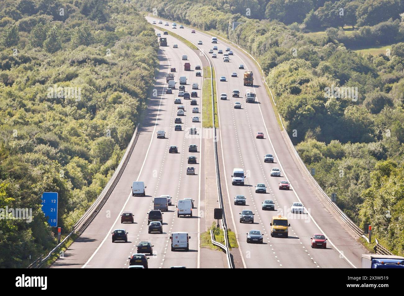 File photo dated 16/08/13 of the M5 Motorway near Bridgend, Wales. The average price paid for comprehensive motor insurance was around a third (33%) or £157 higher in the first quarter of this year than a year earlier, according to figures from the Association of British Insurers (ABI). Based on analysis of policies sold, the typical price paid in the first quarter of 2024 was £635, marking a 1% increase on the previous quarter, the ABI said. Issue date: Monday April 29, 2024. Stock Photo