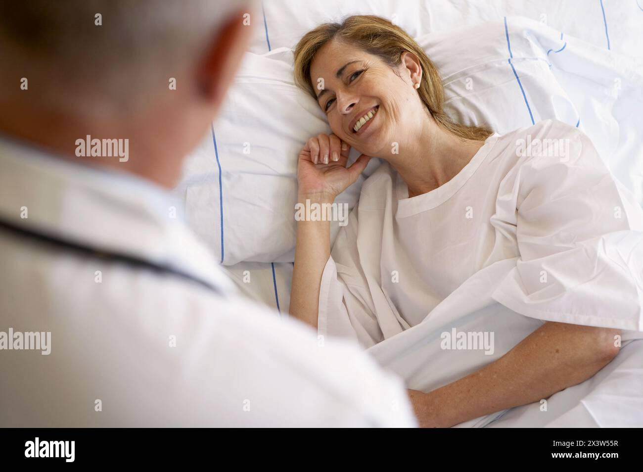 Doctor and patient in hospitalization Stock Photo