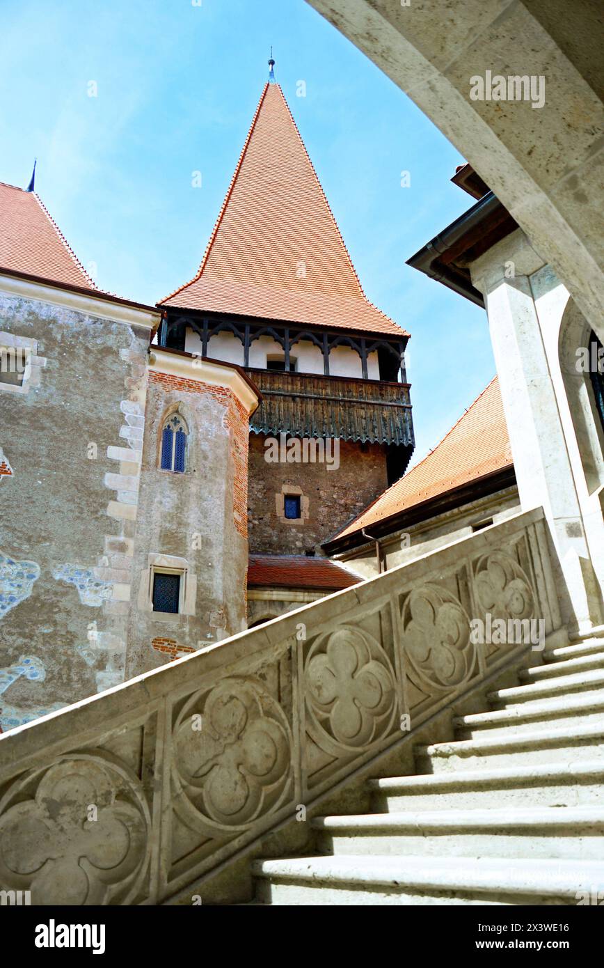 Architecture in the courtyard of the Corvin Castle: view of the Gate Tower and a fragment of the Great Palace from the gallery of the Bethlen Palace Stock Photo