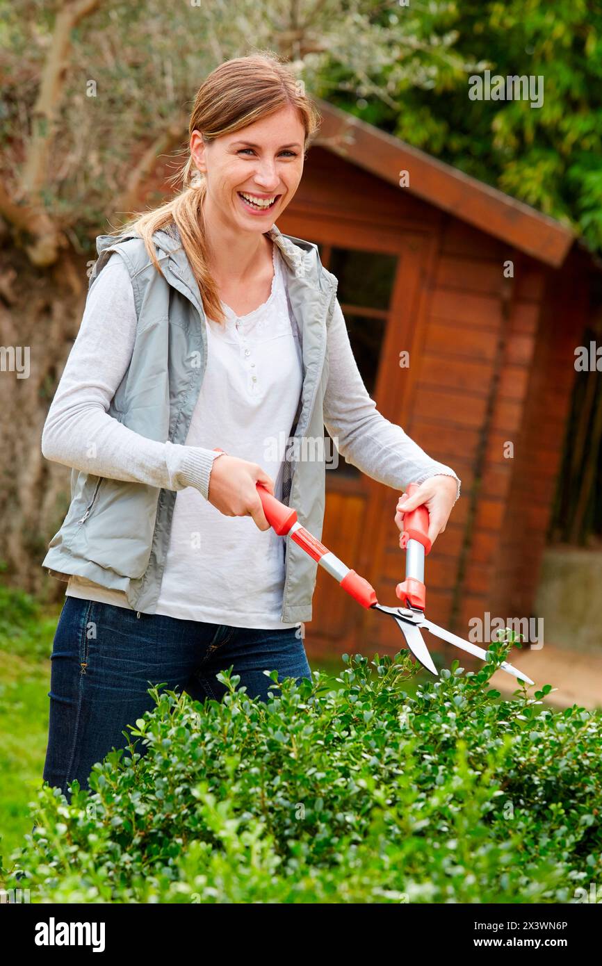 Pruning She Cutting garden hi-res stock photography and images - Alamy
