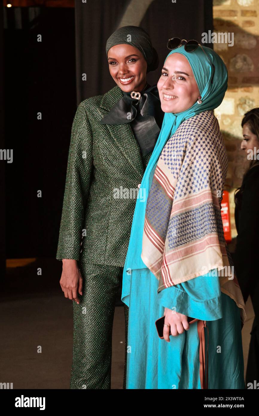 Halima Aden seen posing with a supporter. Somali-American model Halima ...