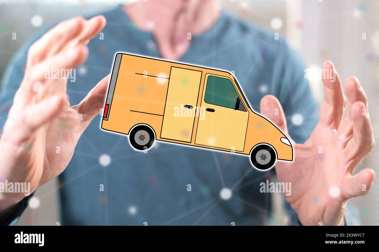 Delivery concept between hands of a man in background Stock Photo