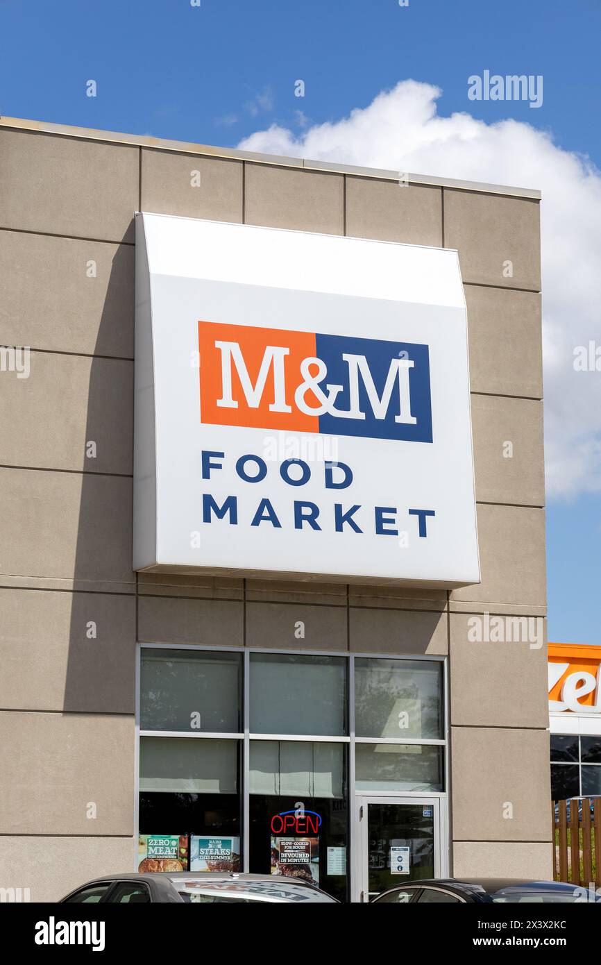 M&M Food Market Store Exterior With Logo Sign On The Store Front Facade, M&M Are A Ready Prepared Frozen Food Speciality Store In Canada, June 8, 2022 Stock Photo