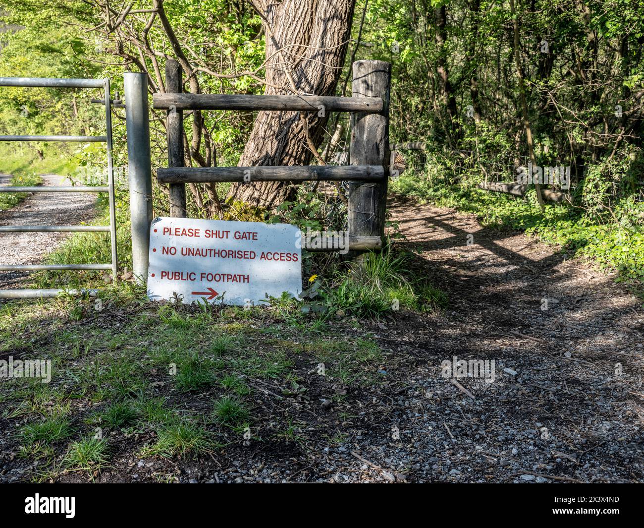 April 2024 - Signs and safety notices Callow hill quarry rear gate entrance in the woods above the Somerset village of Cheddar. Stock Photo