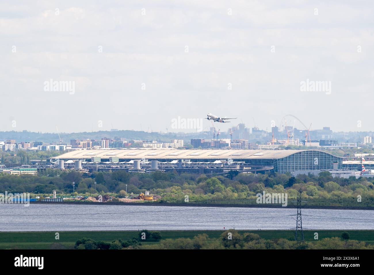 Englefield Green, UK. 29th April, 2024. A Malyasian Airways Airbus A350-941 takes off from London Heathrow. Border Force officers at Heathrow Airport have started a four-day strike today. According to the BBC 'Members of the Public and Commercial Services union (PCS) walked out at 05:00 BST in a dispute over working conditions. It will end on Thursday. The PCS said more than 300 members would go on strike, affecting Heathrow terminals 2, 3, 4 and 5. The Home Office says it is 'disappointed' in the strike action but is open to 'discussing a resolution'.'. Credit: Maureen McLean/Alamy Live News Stock Photo