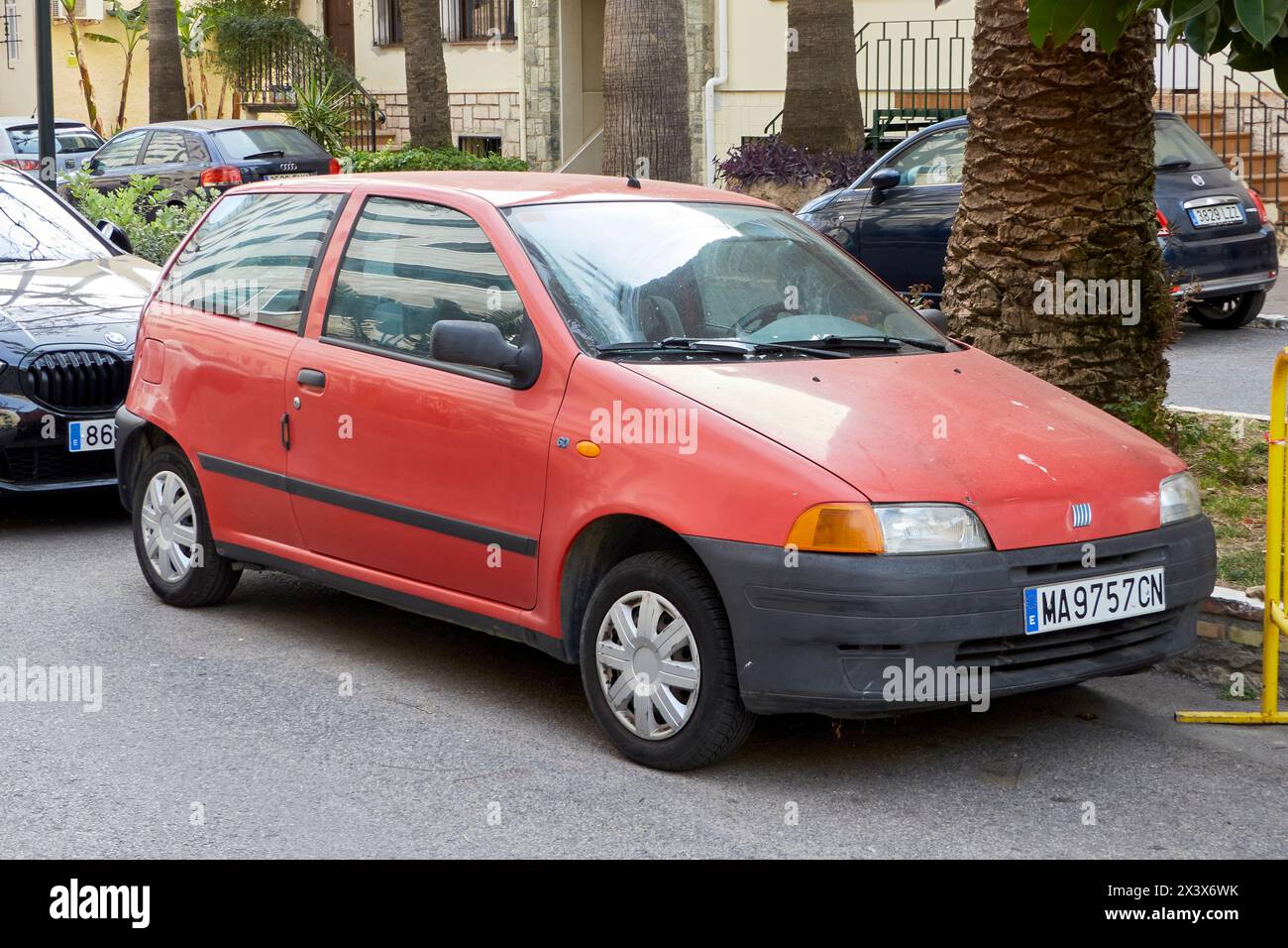 A 1998 first generation Fiat Punto 60 SX parked on the street. Málaga province, Spain. Stock Photo