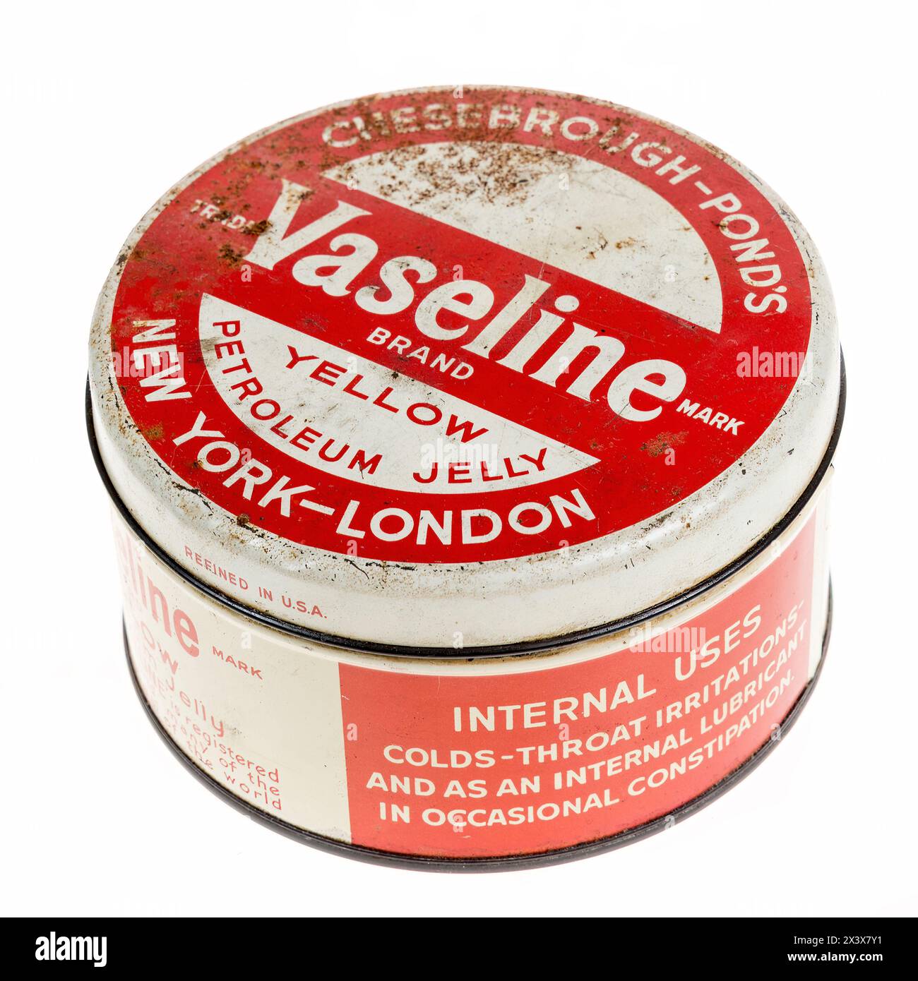 Antique tim of Vaseline with claim for use internally Stock Photo