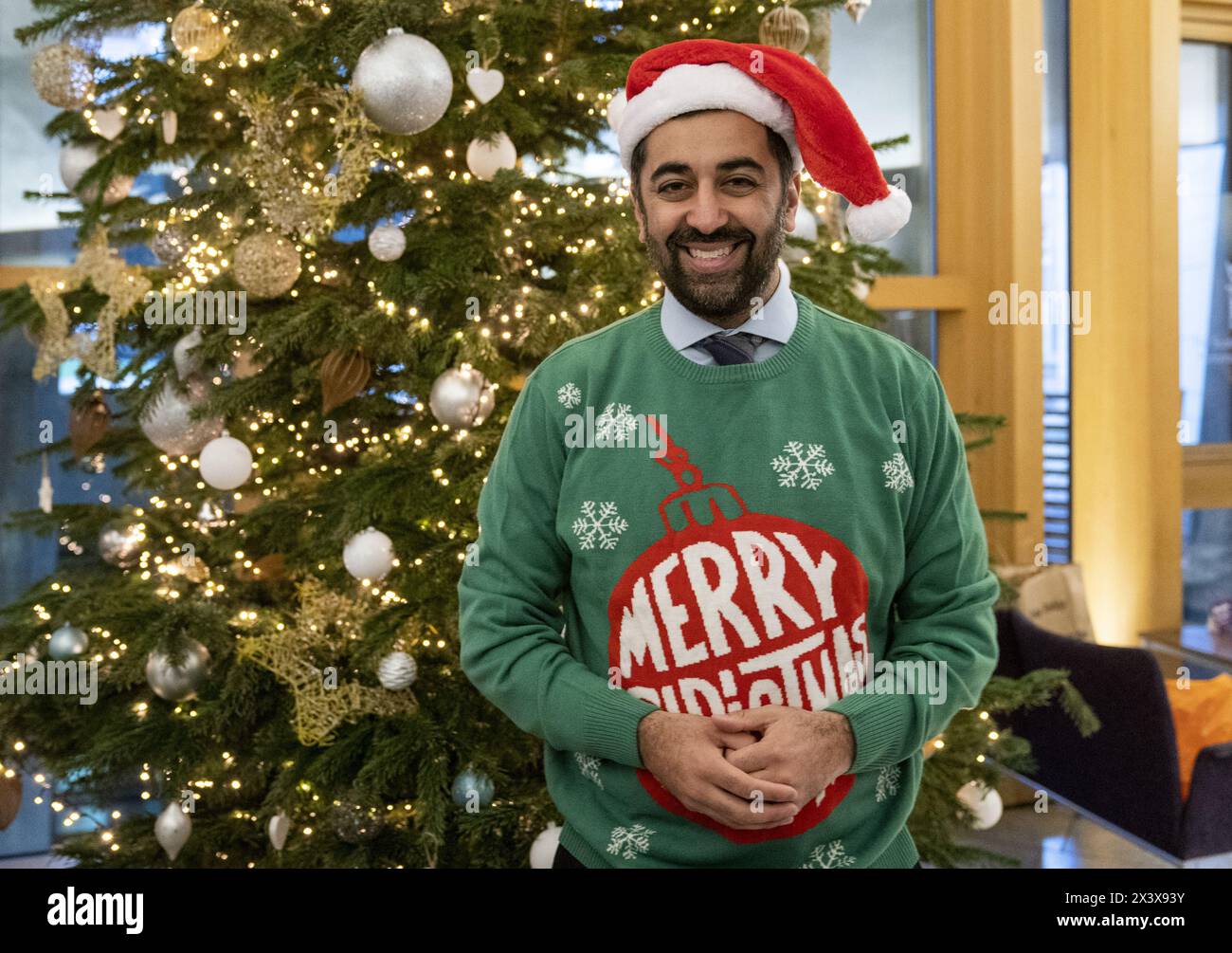 File photo dated 07/12/23 of First Minister Humza Yousaf during a media event to promote the Save the Children 'Christmas Jumper Day' at the Scottish Parliament in Edinburgh. Humza Yousaf has said he will resign as SNP leader and Scotland???s First Minister. Issue date: Monday April 29, 2024. Stock Photo
