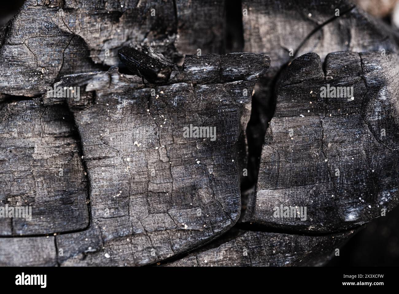 Charcoal burned in fire closeup as a background Stock Photo - Alamy