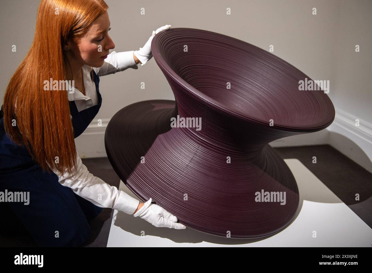 London, England, UK. 29th Apr, 2024. Sotheby's staff member arranges ...
