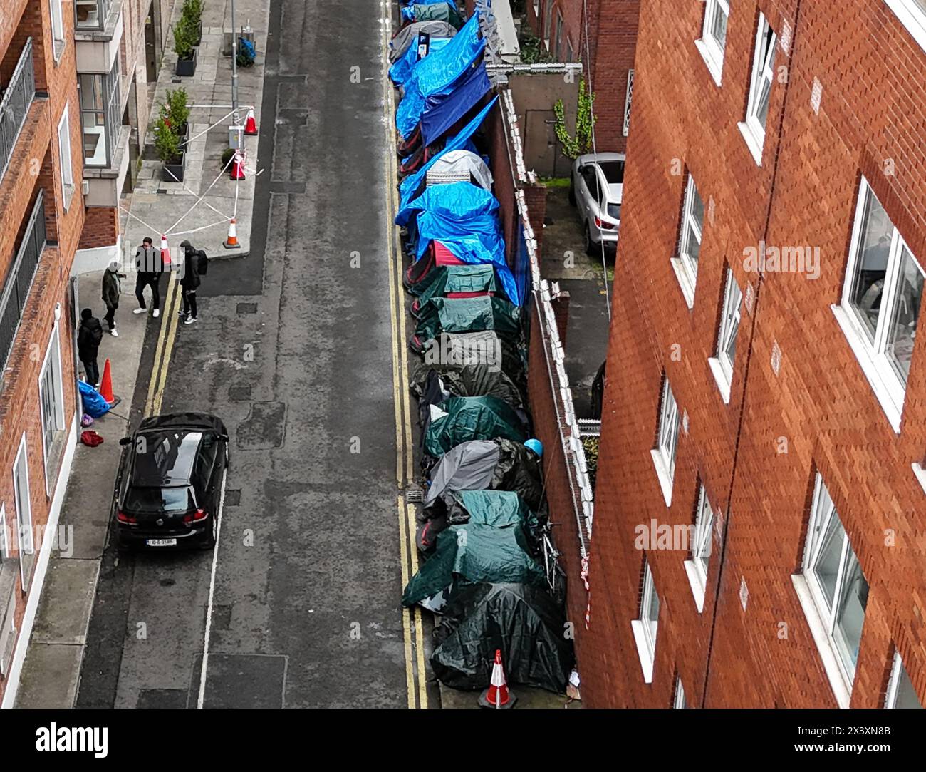 Tents housing asylum seekers near to the Office of International