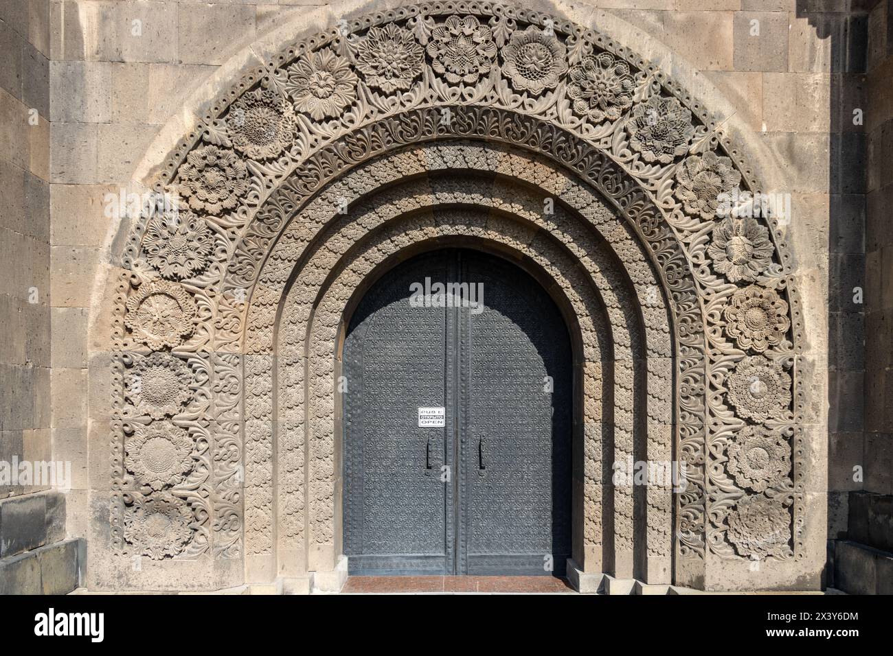 Yerevan, Armenia February 14 2024: Stone arched door. The monumental 'Mother Armenia' statue in the Victory park in Yerevan, the capital of Armenia Stock Photo