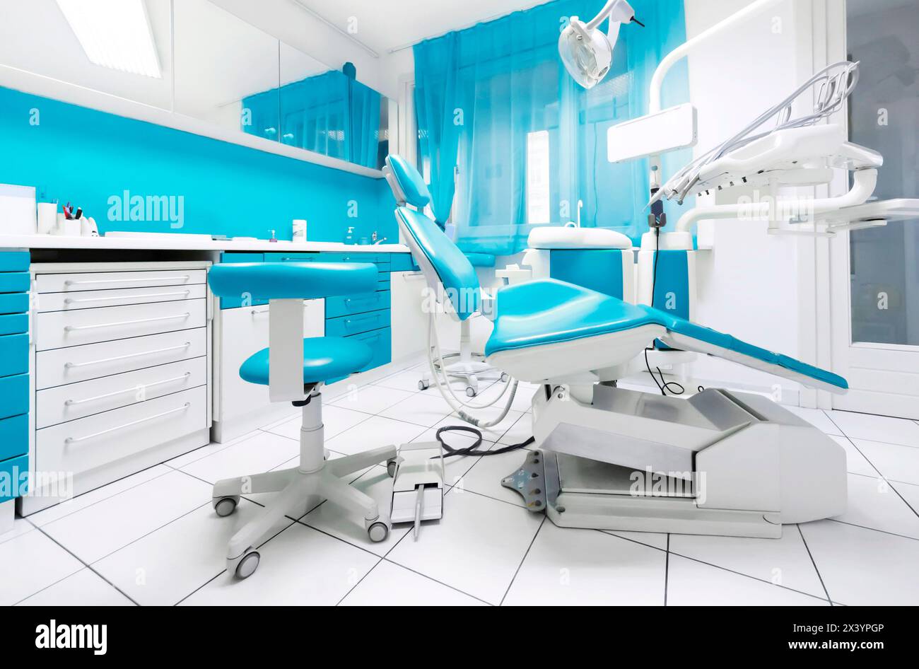 Dental clinic interior with modern dentistry equipment. Dental chairs ...