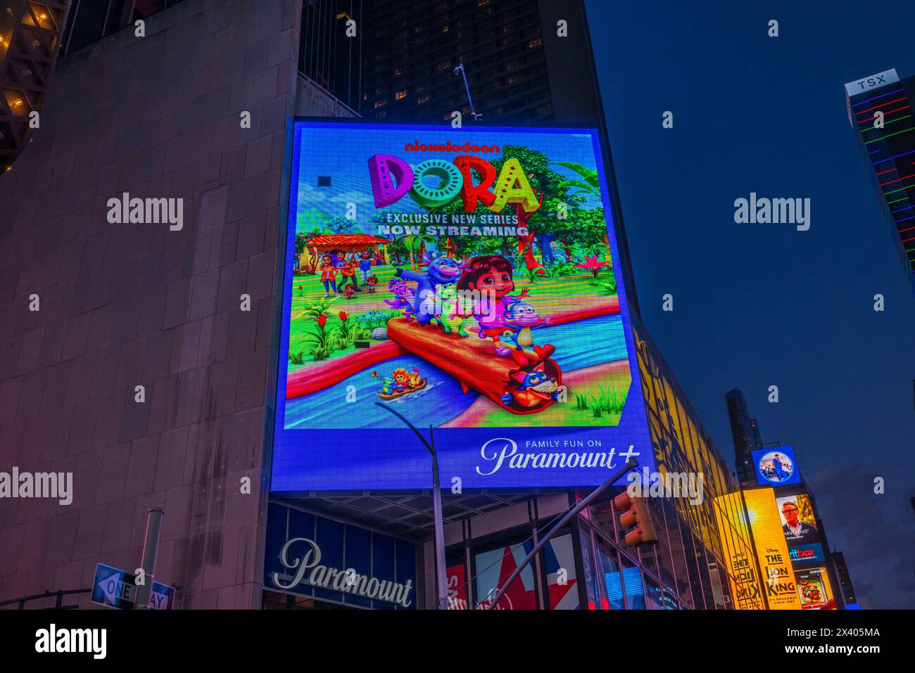 Close-up view of a vibrant billboard advertisement for Nickelodeon's new Dora series streaming on Paramount in Manhattan. NY. USA. Stock Photo