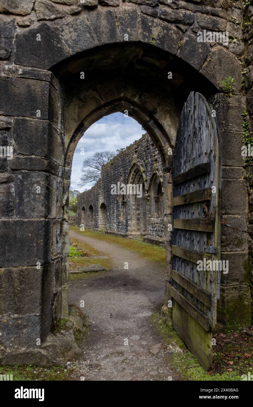 Arched Medieval Doorway in Whalley Abbey in Whalley, Lancashire, England Stock Photo