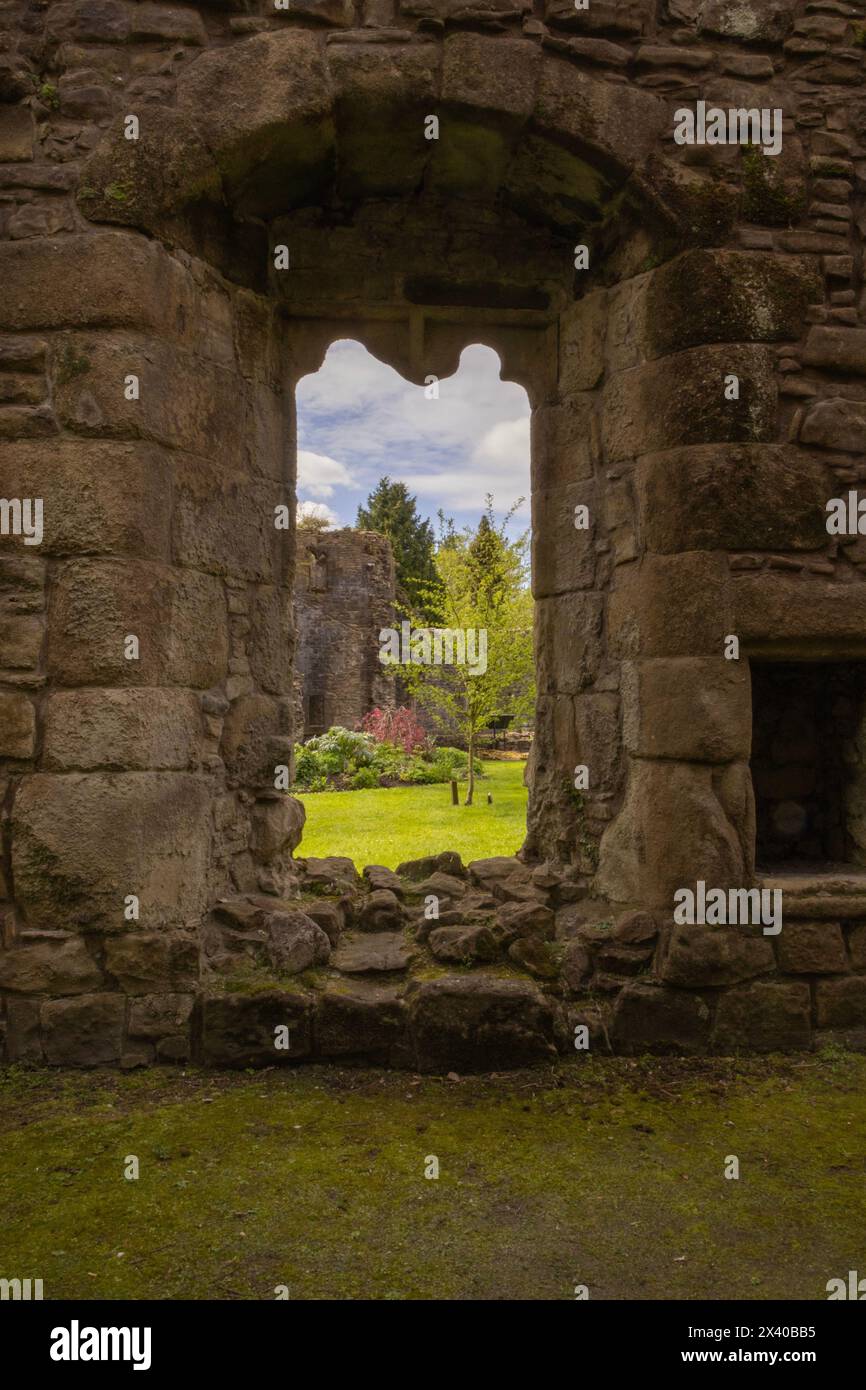 Gardens and Arched Window in Whalley Abbey in Whalley, Lancashire, England Stock Photo