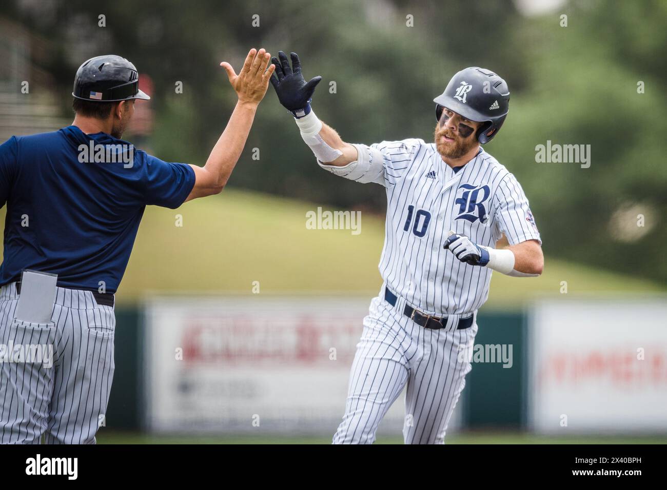 April 28, 2024: Rice Owls utility Ben Dukes (10) celebrates his home ...