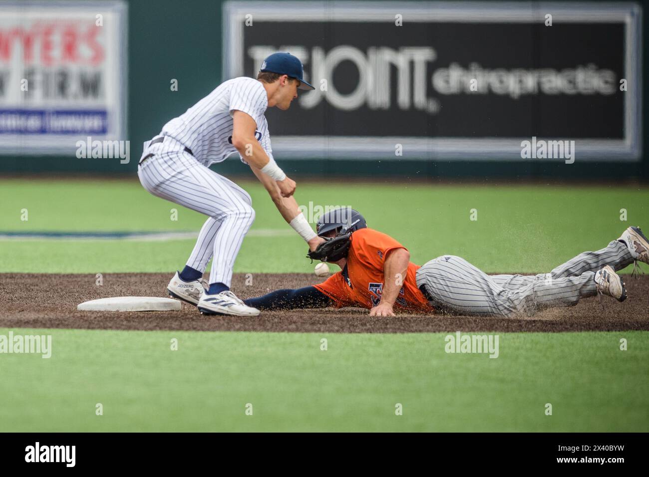 Houston, Texas, USA. 28th Apr, 2024. Rice Owls second baseman Pierce Gallo (3) attempts to tag UTSA Roadrunners catcher Andrew Stucky (27) at second base during the NCAA baseball game between the UTSA Roadrunners and the Rice Owls at Reckling Park in Houston, Texas. Prentice C. James/CSM (Credit Image: © Prentice C. James/Cal Sport Media). Credit: csm/Alamy Live News Stock Photo