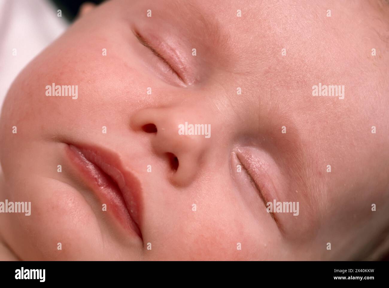 Close view of a baby's sleeping face. Stock Photo
