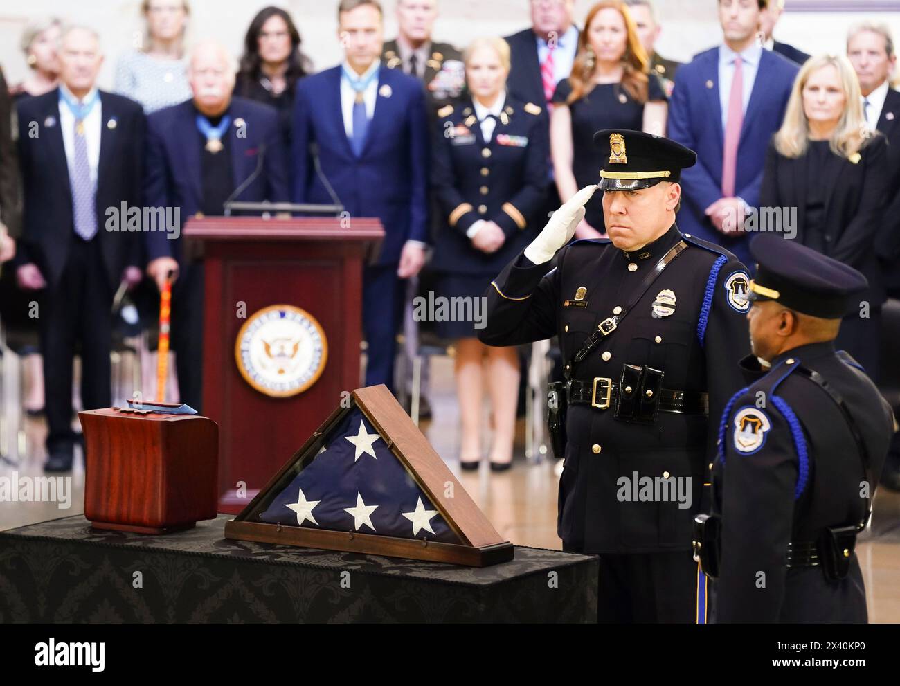 Washington, United States. 29th Apr, 2024. A U.S. Capitol Police honor guard salutes the remains of retired Army Col. Ralph Puckett, the last surviving Medal of Honor recipient for acts performed during the Korean War, to lie in honor in the Rotunda at the U.S. Capitol in Washington DC, on Monday, April 29, 2024. Puckett died on April 8, at his home in Columbus, Ga., at the age of 97. Pool photo by Shawn Thew/UPI Credit: UPI/Alamy Live News Stock Photo