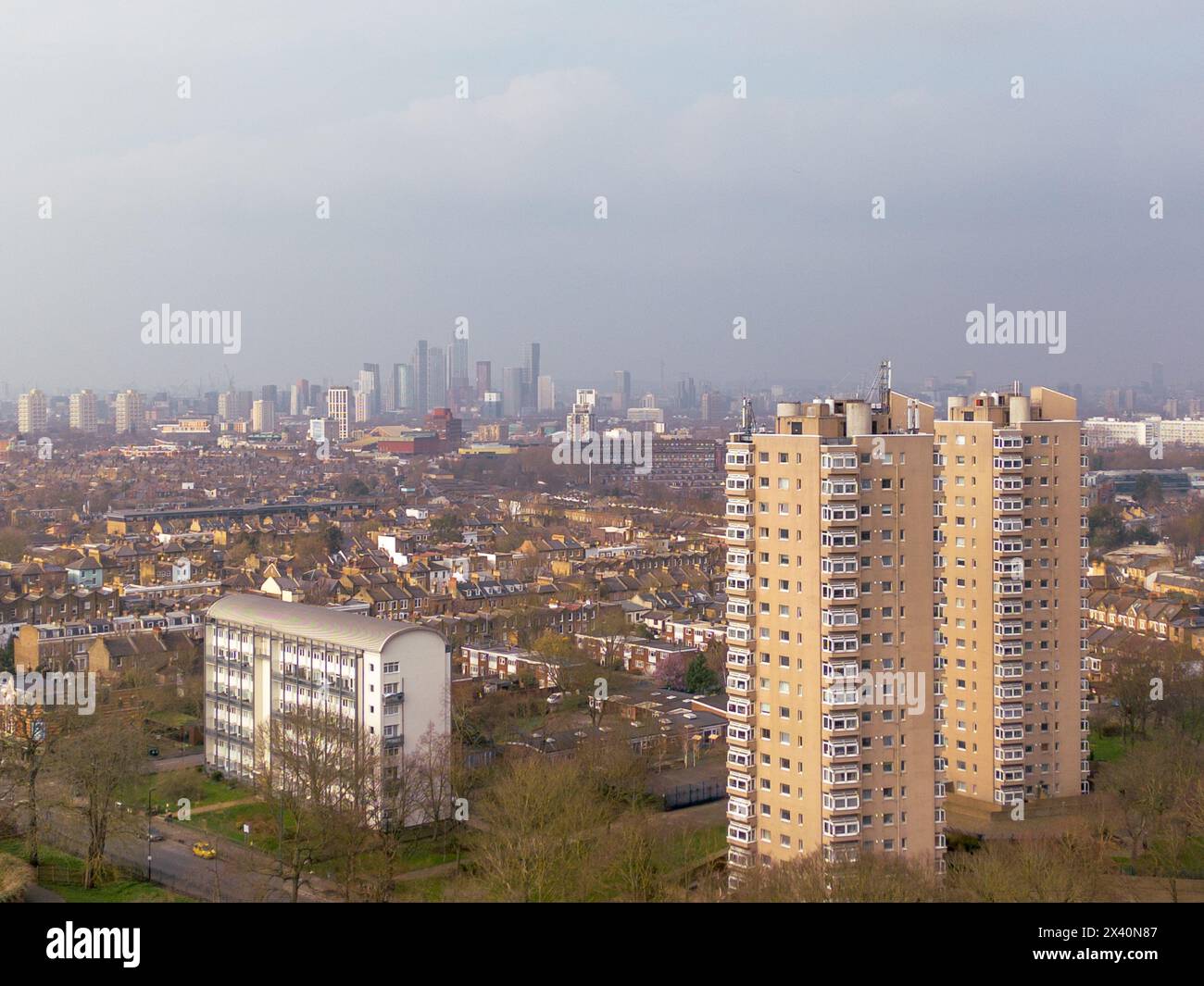 London- Aerial view of London skyline showing train leaving Herne Hill Station and city and residential buildings in background Stock Photo