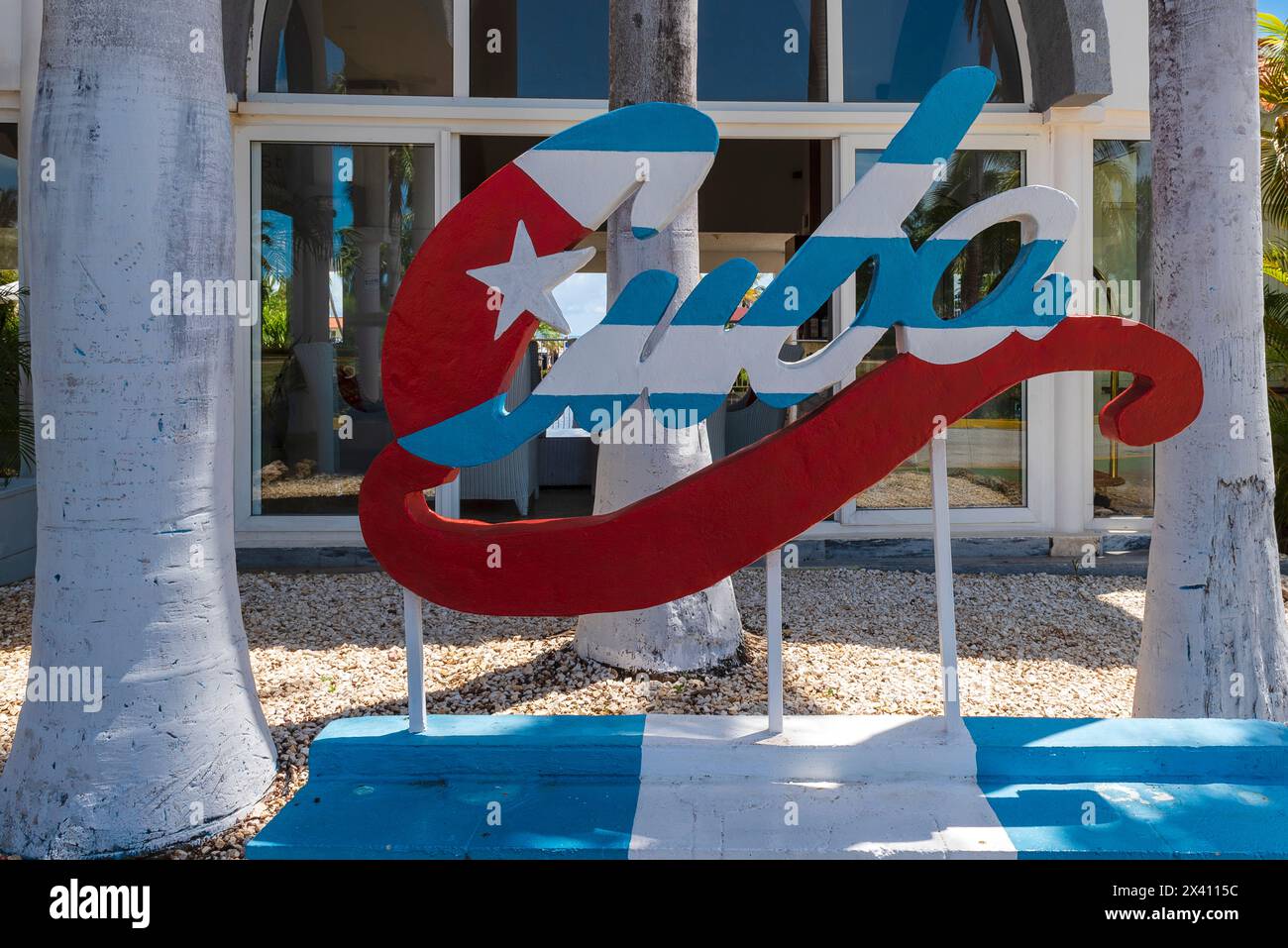 Cuba sign in national colours at the entrance of a resort; Cayo Guillermo, Cuba Stock Photo