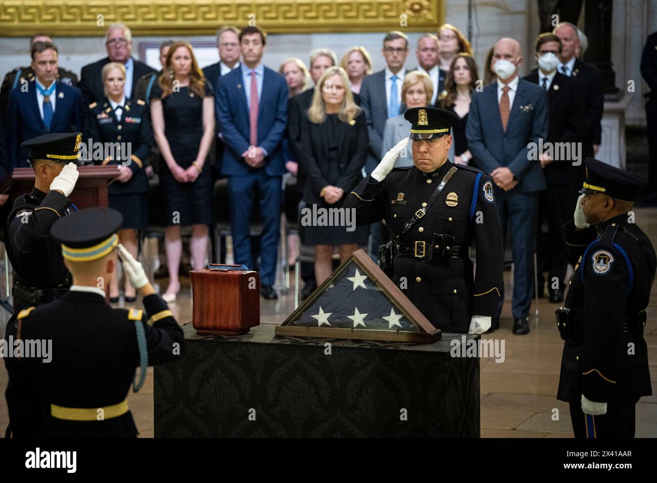 Washington, USA. 29th Apr, 2024. Members of an honor guard salute the remains of Col. Ralph Puckett Jr. during a ceremony to lie in honor at the U.S. Capitol, in Washington, DC, on Monday, April 29, 2024. President Biden awarded the Medal of Honor to Col. Puckett in 2021, and he was the last surviving medal recipient for acts performed during the Korean War. (Graeme Sloan/Sipa USA) Credit: Sipa USA/Alamy Live News Stock Photo