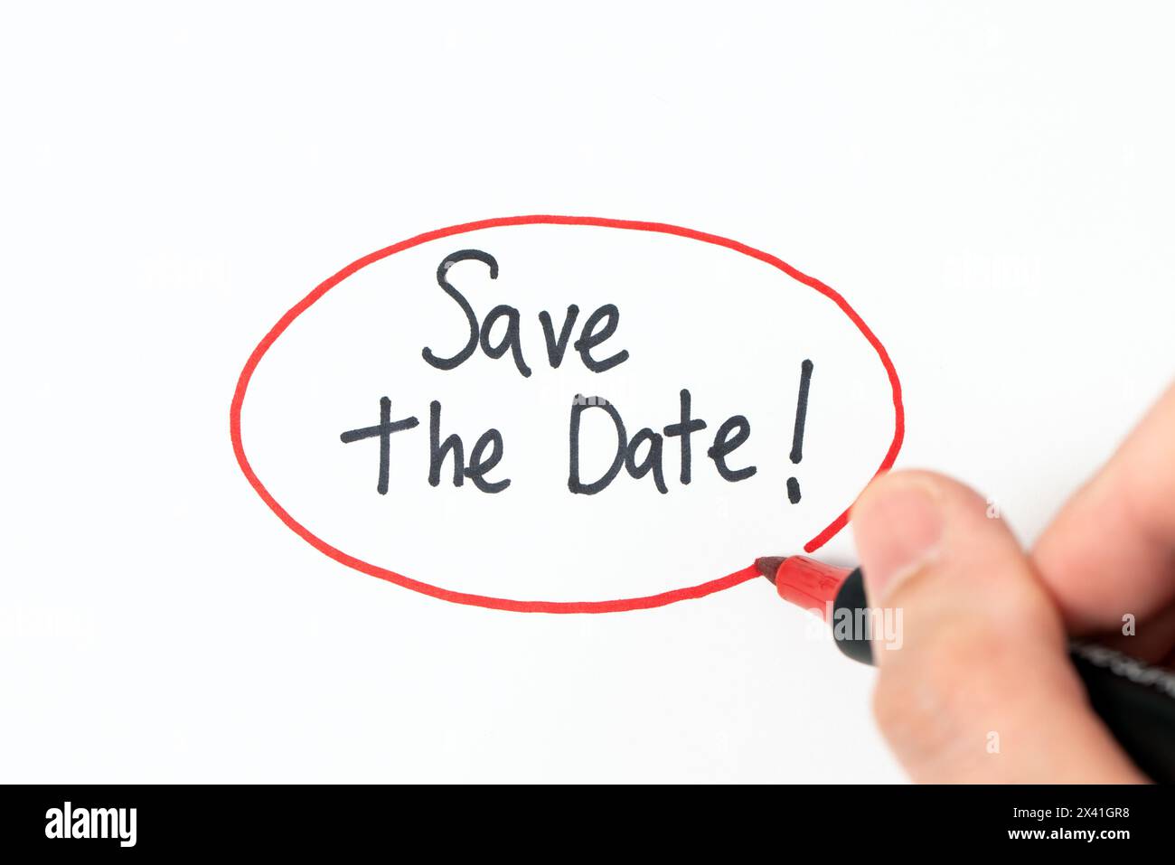 Hand writing text save the date with red marker pen Stock Photo