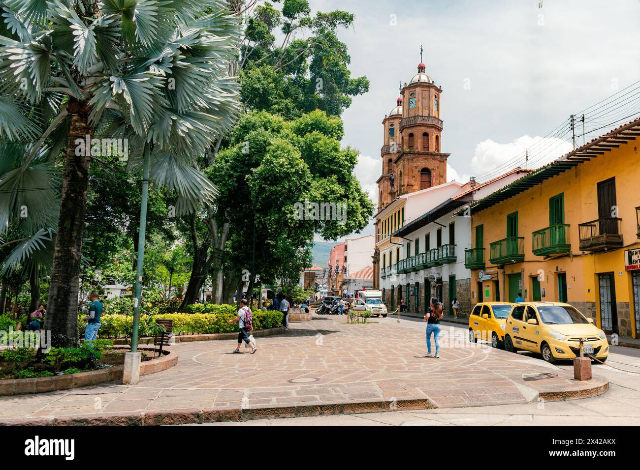 San Gil, Santander, Colombia, April 26, 2024, corner of the main park of San Gil on a sunny day with a view of the cathedral in the background Stock Photo