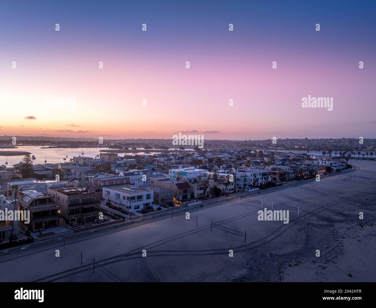 Aerial view of colorful sunrise sky over Mission Beach San Diego with ...