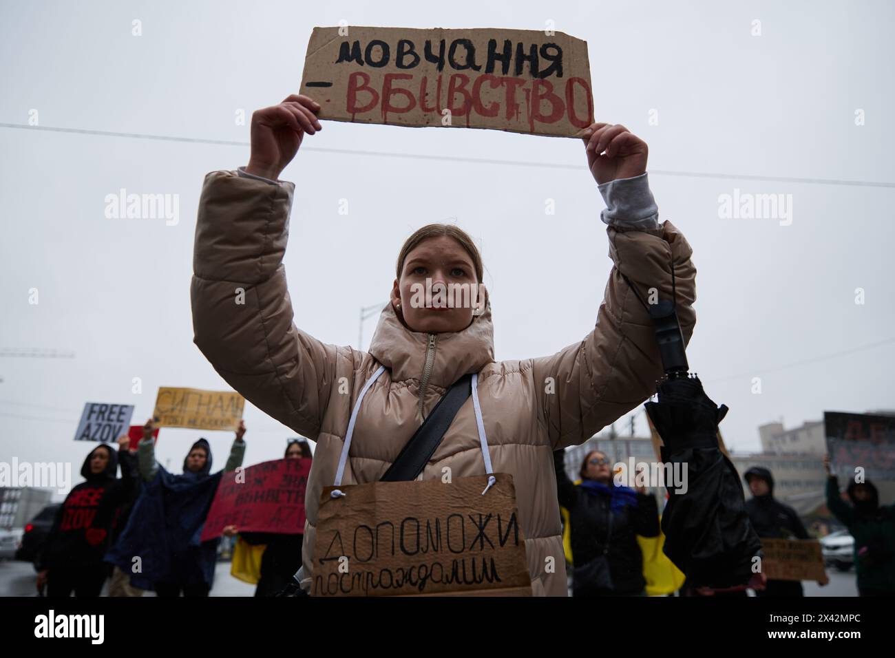 Young Ukrainian girl posing with a sign 