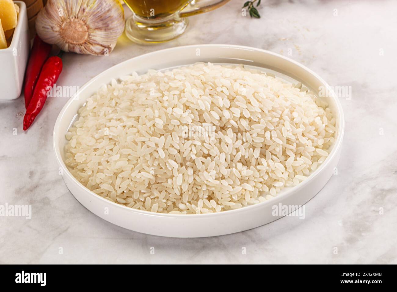 Dry raw Arborio rice for risotto Stock Photo - Alamy