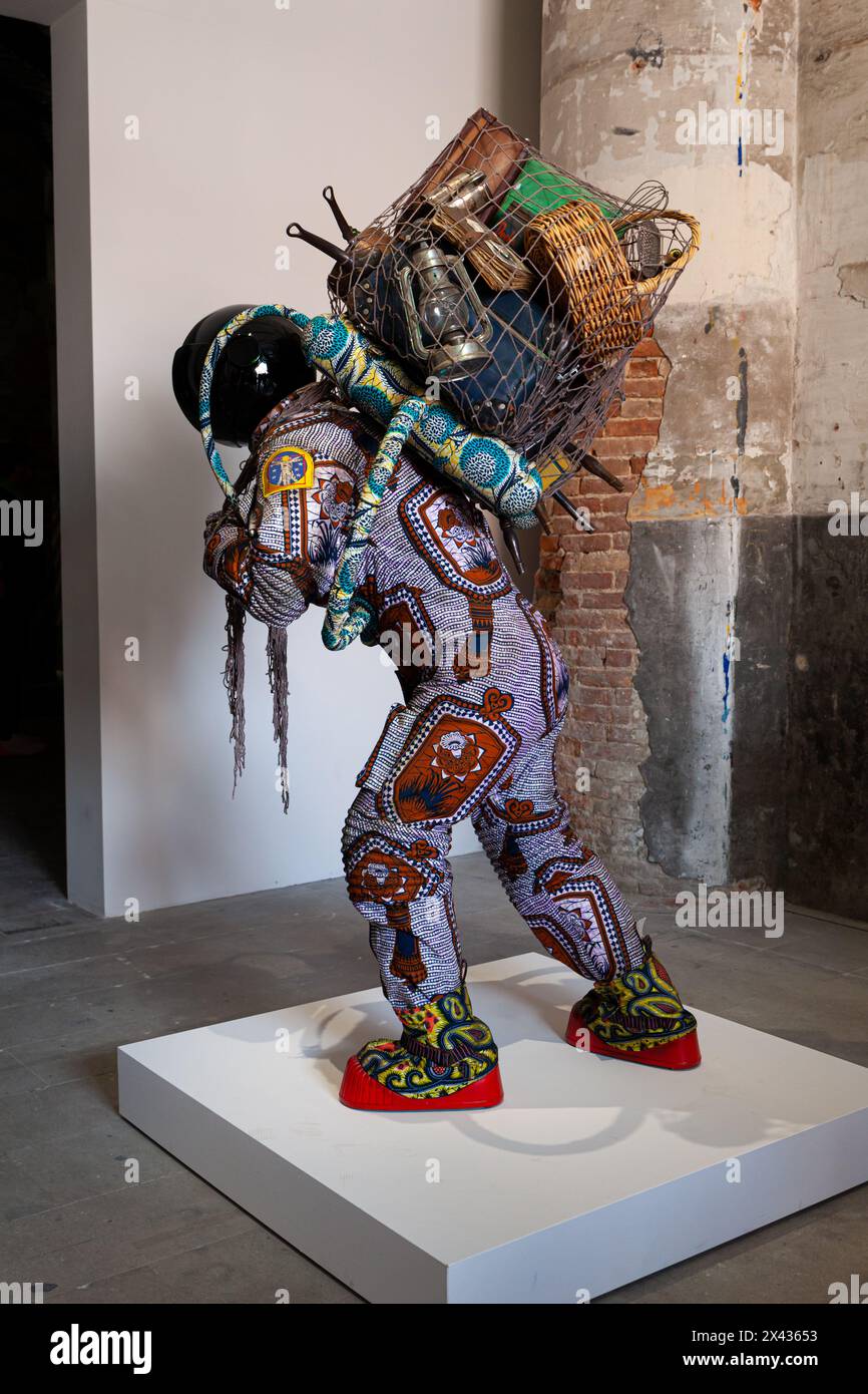 Venice, Italy - April 17, 2024: Installation by Yinka Shonibare titled Refugee Astronaut VIII exposed at the Arsenale during the 60th International Ar Stock Photo